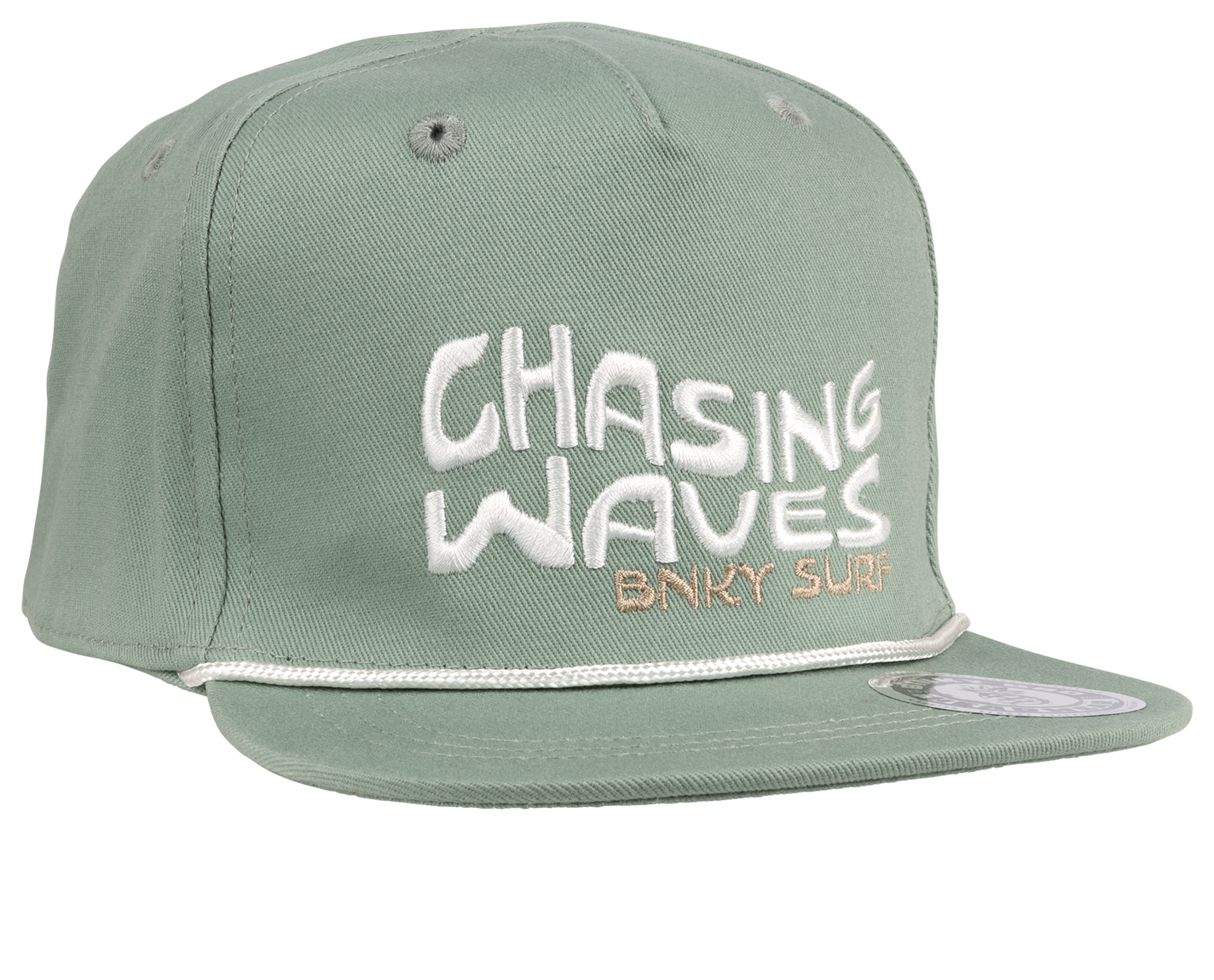 The Chasing Snapback Hat is the perfect accessory for surf and beach lovers of all ages. Featuring an all-teal/green design with an embroidered "Chasing Waves BNKY Surf" logo on the front, this stylish hat is made from 100% high-quality cotton for comfort and durability. Available in infant, toddler, youth, junior, and adult sizes, it’s a great fit for the whole family. Whether you’re hitting the beach or enjoying a casual day out, this snapback hat combines coastal vibes with everyday functionality. Perfec
