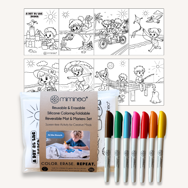 A minneo reversible coloring activity set shown with six color markers in front of a printed coloring page example. The set includes a silicone folding mat and a package card labeled 'Reusable & Erasable Silicone Coloring Foldable Reversible Mat & Markers Set' with the brand name minneo visible.