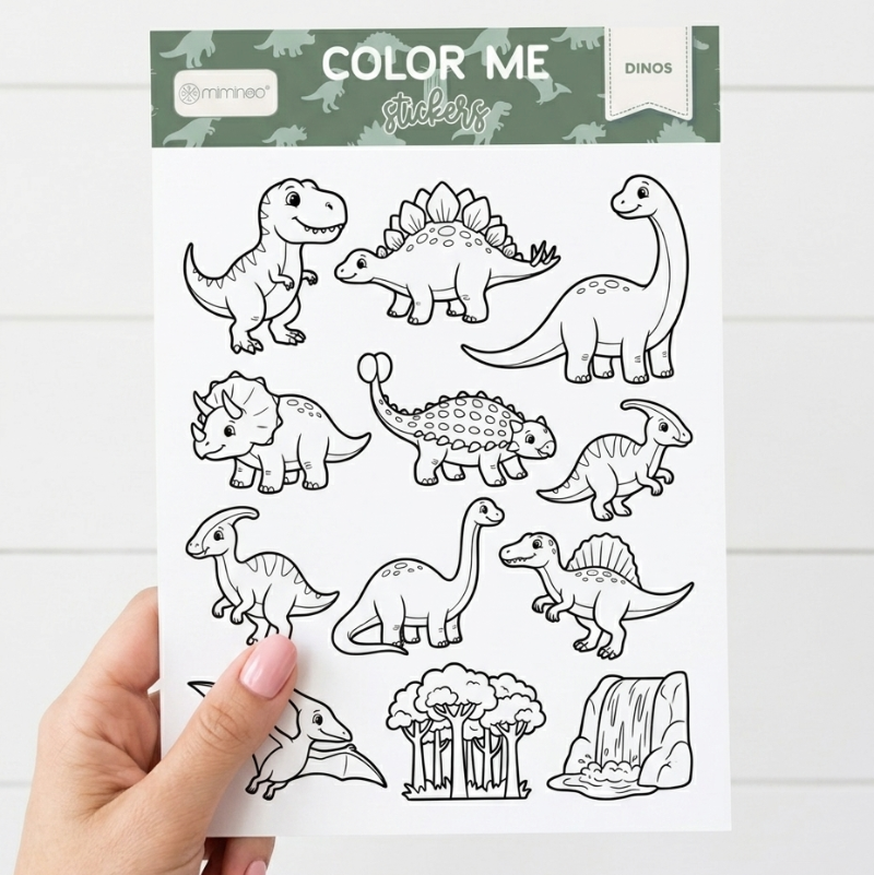 a hand holding dinosaurs sticker sheet from miminoo 