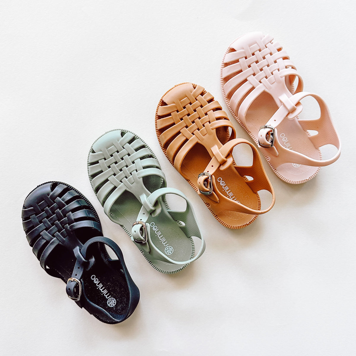A pair of MKS Miminoo Flexible PVC Summer waterproof Sandals in Sage, terracotta, blush pink and black for boys and girls toddlers and babies