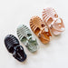 A pair of MKS Miminoo Flexible PVC Summer waterproof Sandals in Sage, terracotta, blush pink and black for boys and girls toddlers and babies